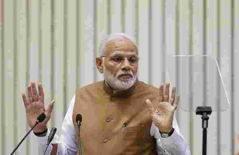 PM Modi Dubs Dubs大會的貸款豁免作為政治特技